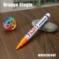 Orange paint marker for waterproof tire repair and furniture color touch up applications. - 0.7mm Orange