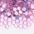 Detail view of sparkling pink flatback glass rhinestones, perfect for DIY crafts and nail art. - 22 Light Pink / SS6 (~1.9-2.0mm) 1440 Pcs