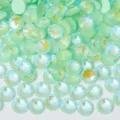 Close-up detail of light green AB flatback crystal rhinestones for DIY crafts and nail art. - ss3 (1.3-1.4mm) 1440 Pieces / 190 Glow in the Dark Light Green Fluorescent AB