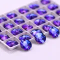 Purple glass crystal sew-on buttons close-up detail for DIY apparel accessories and crafts - 12mm 40 Pieces/Pack / 49 Blue Flame