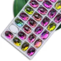 Aufnähbare ovale Strasssteine mit Doppellöchern, bunte Glassteine für DIY Kleidung Accessoires. - 11x16 mm 36 Stk./Packung / 24 Bunt