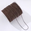 Roll of brown metal ball chain for DIY nail art crafts and decorative jewelry making. - Brown