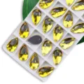 Strass de cristal en lágrima amarilla para coser doble agujero DIY joyas vestido accesorios - 11x18mm 28 Piezas/Paquete / Amarillo Dorado