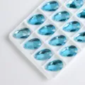 Strass de vidrio en forma de lágrima para coser con doble agujero para manualidades. - 11x18mm 28 Piezas/Paquete / Azul lago