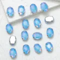 Oval crystal glass rhinestones with claw settings, perfect for DIY jewelry and clothing accessories. - 10x14mm 20 Pcs/Pack / 48 Light Blue Opal Mocha