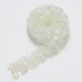 Detailed view of adhesive crystal rhinestone ribbon roll, sparkling AB color DIY trim. - 02 Off-White Cream AB (Flatback Rhinestones)