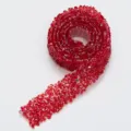 Close-up detail of red rhinestone ribbon trim, self-adhesive sparkling crystal mesh roll. - 08 Bright Red AB