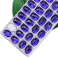 Aufnähsteine ovale Strasssteine Kristall Glas Steine Flachrücken Löcher DIY Kleidung Handwerk - 7x10 mm 72 Stk./Packung / Königsblau