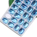 Blaue ovale Strasssteine zum Aufnähnen Flachrücken Kristall Glas für DIY Kleidung Handwerk. - 7x10 mm 72 Stk./Packung / 05 Seeblau