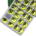 Gelbe ovale Glasstrasssteine zum Aufnähen mit flacher Rückseite und zwei Löchern für DIY. - 7x10 mm 72 Stk./Packung / 10 Zitronengelb