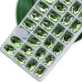 Grüne ovale Strasssteine zum Annähen mit doppelten Löchern für DIY Kleidung und Dekoration. - 7x10 mm 72 Stk./Packung / Fruchtgrün
