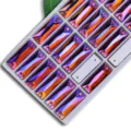 Rectangular dual-hole glass sew-on rhinestones with vibrant AB color finish in tray. - Brown AB
