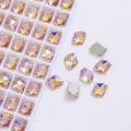 Primer plano de cristales de costura de vidrio K9, con color AB y detalles de doble agujero. - 9*12 mm 48 uds./paquete / Dorado AB