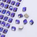 Close-up of purple AB sew-on crystal rhinestones with double holes for DIY apparel and crafts. - Dark Purple AB