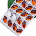 Amberkleurige navette strass steentjes in tray voor DIY trouwjurk kleding decoratie. - 9*18 mm 28 st./pak / Oranjerood