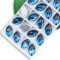 Blauwe markies glas naai strassstenen met platte achterkant voor DIY kledingdecoratie knutselen. - 9*18 mm 28 st./pak / Pauwenblauw