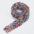 Close-up detail of sparkling multicolored resin rhinestone ribbon trim for DIY crafts and decor. - Mixed Colors with Silver Base (18)