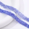 Close-up detail of blue rhinestone adhesive trim for DIY crafts, shoes, and clothing decoration. - 31 Dark Blue AB