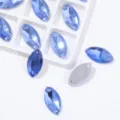 Blauwe glas strass steentjes om te naaien in navette vorm voor DIY trouwjurken en kleding - 5*10 mm 72 st./pak / Lichtblauw