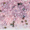 Mixed pink flatback pearls and AB rhinestones for DIY nail art and phone case crafts. - Half-Round Pearls Mixed Pink Black AB Series - X