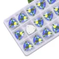 Fat triangle AB glass sew-on rhinestones detail view, shimmering crystal flatback craft diamonds. - 12mm 28 Pieces/Pack / 41 Fruit Green AB
