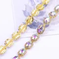 Colorful oval rhinestone chain for clothing, waist belts, shoes, and decorative accessories. - 02 Gold Base AB