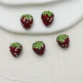 Close-up detail shot of sparkling strawberry rhinestone DIY beads, perfect for custom jewelry. - Wine Red