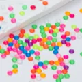 Colorful flatback rhinestones for DIY clothing crafts, shiny crystal gems for dress sewing decor. - Fluorescent Mixed