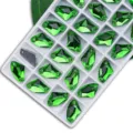 Green axe-shaped double-hole sew-on glass rhinestones for DIY dress apparel sewing accessories. - 5*10mm (72 pcs/pack) / Grass Green