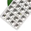 Clear round sew-on glass rhinestones with double holes for garments and crafts decor. - 14mm 28 Pieces/Pack / Clear White