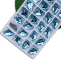 Light blue crystal rhinestones with dual holes, axe shaped flatback DIY craft buttons. - Lake Blue