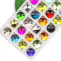 Colorful round glass sew on rhinestones with dual holes, multi-faceted sparkling buttons. - 14mm 28 Pieces/Pack / Multicolor