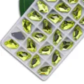 Yellow glass sew-on rhinestones with dual holes, perfect for DIY dresses and apparel crafts. - Lemon Yellow