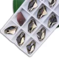 Shaped glass rhinestones with double holes for DIY dress sewing, sparkling crystal apparel accessories. - Coffee