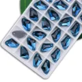 Blue axe-shaped dual-hole sew-on glass rhinestones for DIY garment and dress decor - Peacock Blue