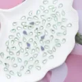 8x4.8mm kristal glas druppel hotfix strass stenen platte rug glanzende nail art decor - 100 Stuks/Pak / Lichtgroen