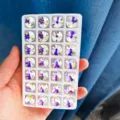 Round glass sew-on rhinestones with dual holes, AB color crystal flatback buttons for DIY crafts. - 14mm 28 Pieces/Pack / 58 Light of Heaven