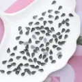 Kristalglas druppel vorm platte achterkant hotfix strass voor nail art en decoratie - 100 Stuks/Pak / Transparant Grijs