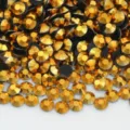 Golden resin flatback rhinestones bulk pack for DIY crafts, garments, and clothing accessories. - SS10 2.35mm 72000pcs/pack / 27 Mineral Gold
