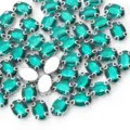Strass ovali in vetro verde montatura argentata accessori per cucire abbigliamento - 10 x 14 mm 50 pz/confezione / Verde a 14 fori