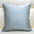Close-up of light blue luxury throw pillow cover with elegant gold leaf jacquard detail. - Light Blue 06 Piping