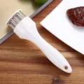 Handheld meat tenderizer tool with white handle and durable stainless steel needles for cooking. - 21-Pin Style / White