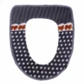 Thick plush toilet seat cover with grey polka dots and cute bow design for warm home use. - Gray