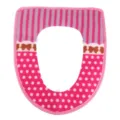 Pink plush toilet seat cover with cute polka dot and striped design for winter warmth. - Pink