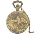 Vintage bronze quartz pocket watch detail showing exquisite embossed three horses design and chain. - Three Horses