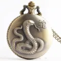 Vintage bronze Chinese zodiac snake quartz pocket watch with long chain necklace accessory. - Zodiac Snake