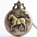 Vintage bronze quartz pocket watch with embossed 3D running horse motif and chain necklace accessory. - Horse Zodiac