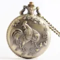 Vintage bronze quartz pocket watch with Chinese zodiac rooster relief, retro necklace chain. - Rooster Zodiac