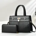 Stylish black women's handbag set with embossed texture and metal lock detail for daily wear. - Black