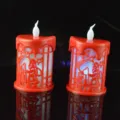 Bougie électronique LED de Noël, ornement de décoration de bureau Père Noël creux rouge. - Rouge